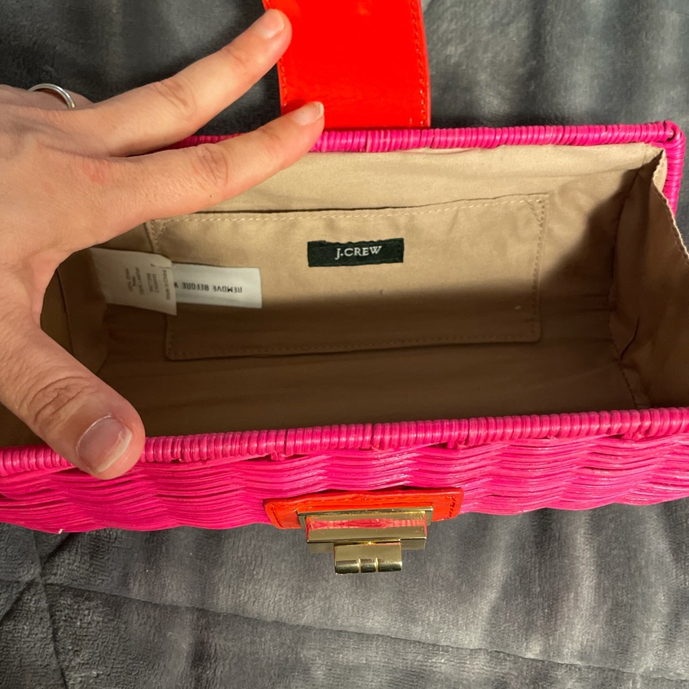 JCREW hot pink and orange clutch.
